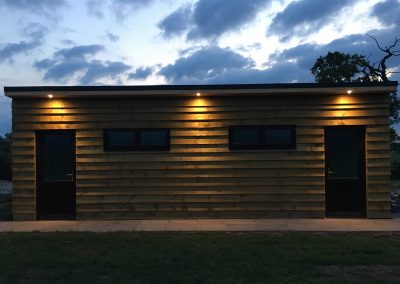 Pitch and Canvas | Glamping and Camping in Cheshire | Toilet block at night