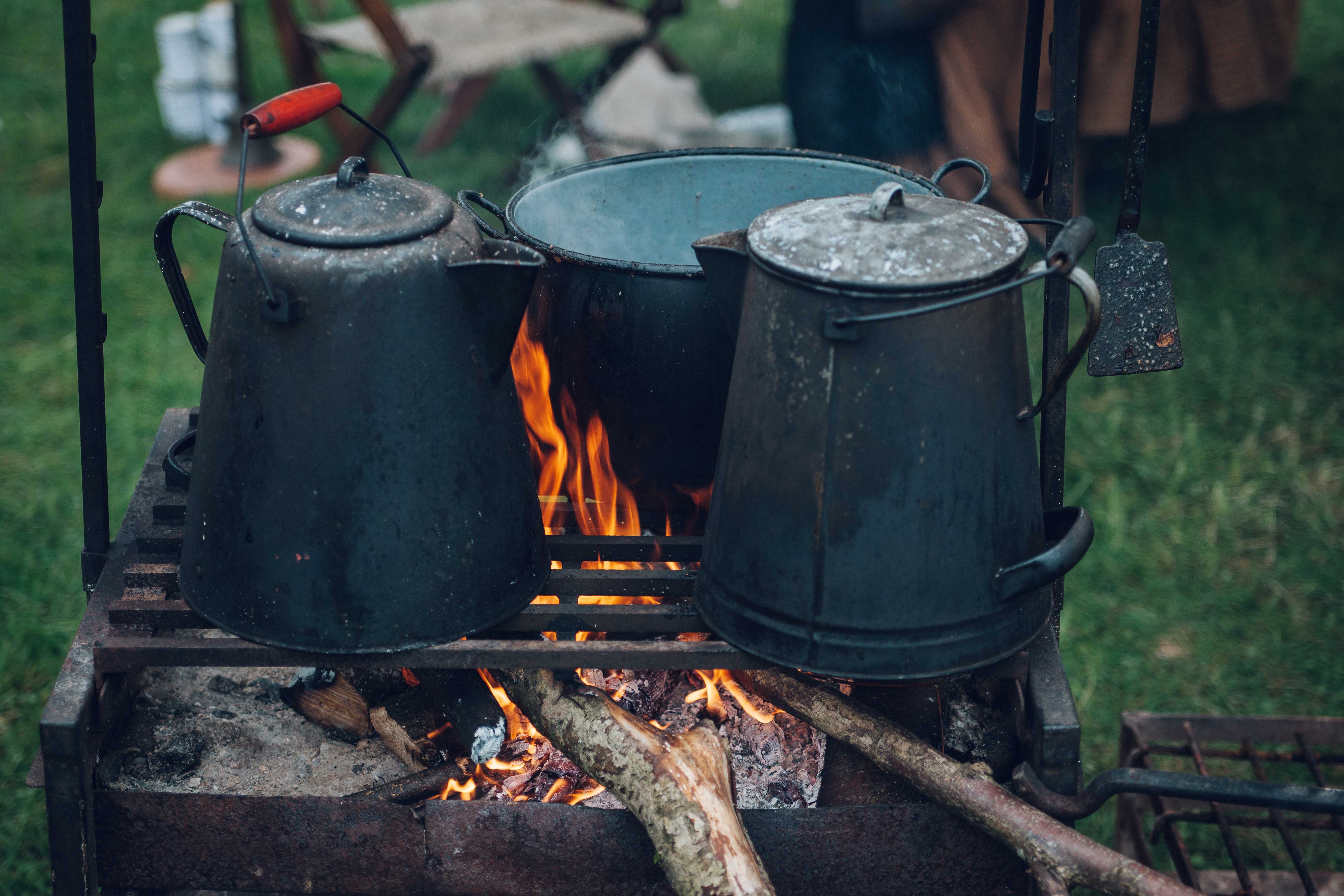 Pitch and Canvas | Glamping and Camping in Cheshire | Making tea over fire pit