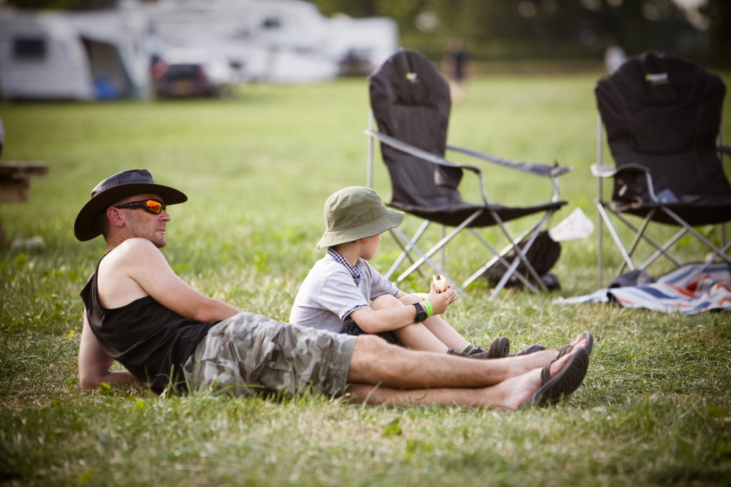 Pitch and Canvas | Glamping and Camping in Cheshire | father and son relaxing